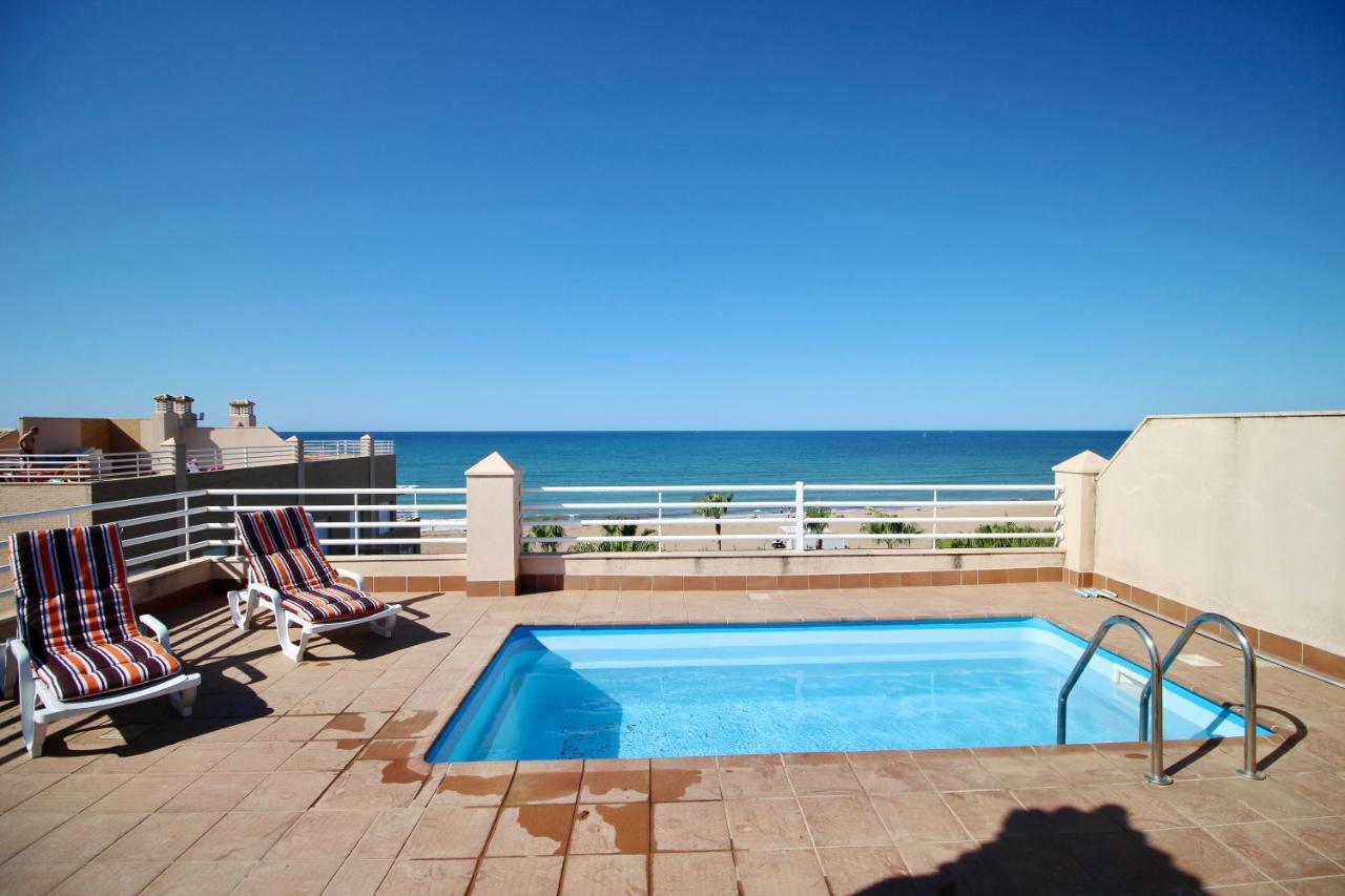 Atico Con Piscina Privada En Primera Linea Leilighet Denia Rom bilde